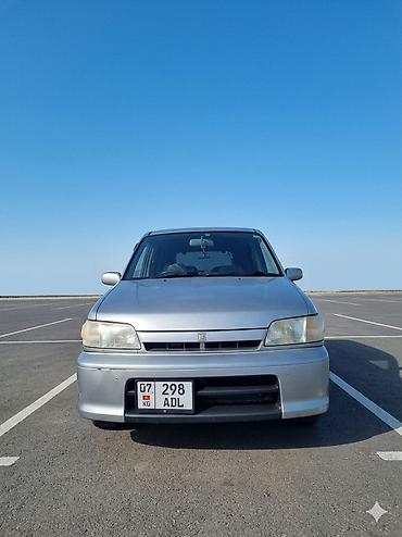 растрочка машина: Nissan Cube: 2000 г., 1.3 л, Автомат, Бензин, Минивэн — 1
