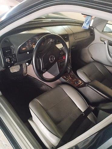 disk 14: Mercedes-Benz C 200: 2 l | 1999 il Sedan — 6
