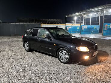 Mazda: Mazda 323: 2002 г., 1.6 л, Механика, Бензин, Хэтчбэк — 9