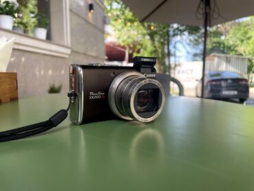 цифровой фотоапарат: Цифровой фотоаппарат Canon PowerShot SX200 IS. SX200 IS – цифровая