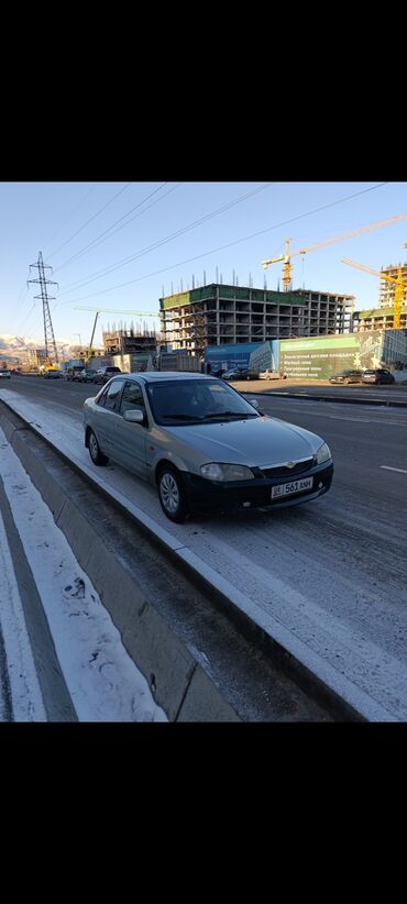 Mazda: Mazda 323: 1999 г., 1.5 л, Механика, Бензин, Седан