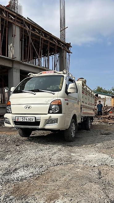 Hyundai Porter (малотоннажный самосвал/бордовый грузовик) Описание: -
