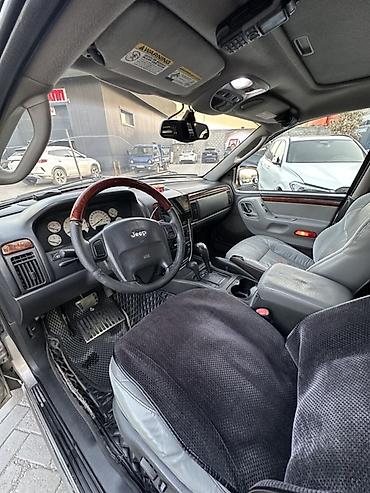 з мах: Jeep Grand Cherokee: 2002 г., 4.7 л, Автомат, Газ, Внедорожник — 4