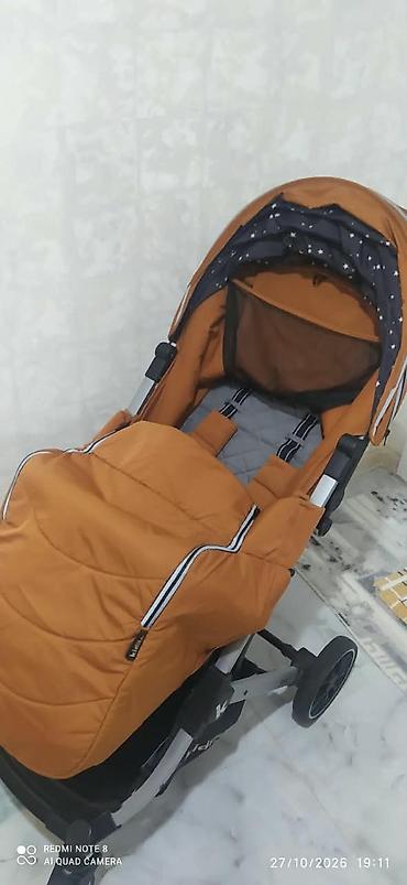 Uşaq arabaları: Uşaq arabası – Kidilo, 4 təkərli, tünd narıncı rəng. Xüsusiyyətlər: - — 1