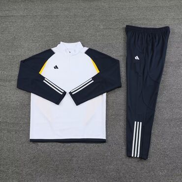 İdman geyimləri: Adidas firmasının idman dəsti, uzunqol köynək və şalvardan ibarətdir