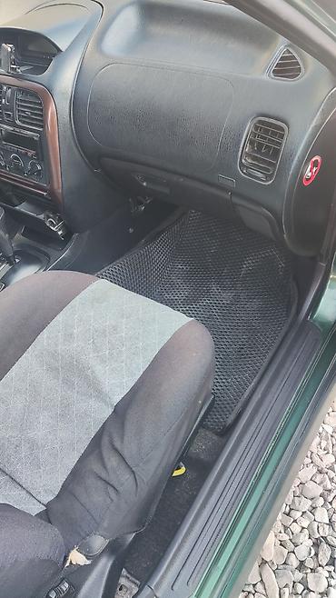 купить мазерати: Mitsubishi Carisma: 1999 г., Бензин, Седан — 9