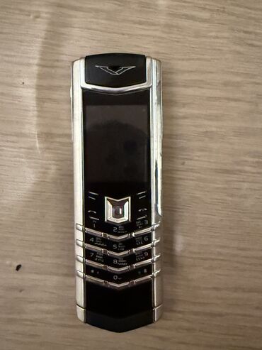 сотовый телефон fly ts113 черный: Vertu Ti