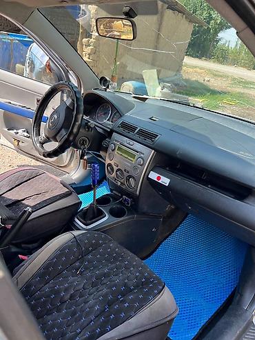 Mazda 2: 2003 г., 1.6 л, Кол менен иштөөчү, Бензин, Хетчбек — 5