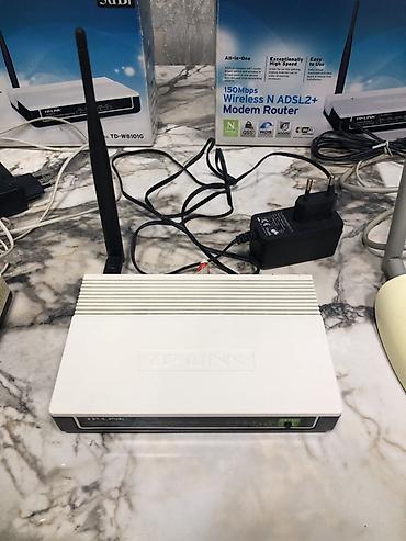 ikinci əl ıran pecləri: Wi-Fi internet ucun modem router TP-LINK . Islek veziyetde . Biri 10 — 3