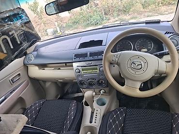 range over: Mazda Demio: 2002 г., 1.3 л, Бензин — 2