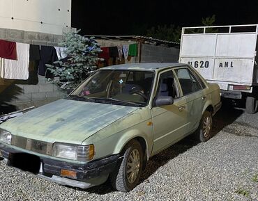 polo авто: Mazda 323: 1987 г., 1.5 л, Механика, Бензин, Седан