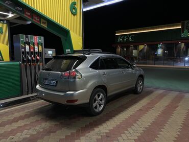 лексус rx 330 новый цена: Полноразмерный кроссовер Lexus RX 350, выполненный в серебристом