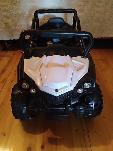 matasklet usaq: Uşaq üçün elektrikli off-road tipli maşın - Korpus: qara-ağ rəngdə — 1