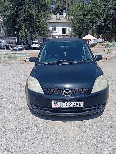 коврик: Mazda Demio: 2005 г., Автомат, Бензин, Хэтчбэк — 6