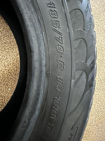 резина 14 с: Пара автомобильных шин 185/70 R14 88T. в одной шине есть дырка - — 2