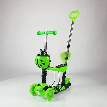 activity junior: Trotinet "Bubamara" 5u1 – Zeleni, za uzrast 1+ Ovaj multifunkcionalni — 1