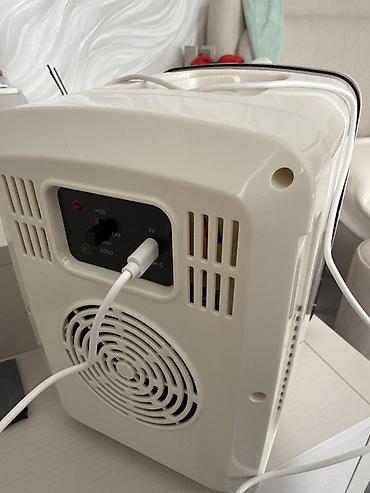mini vitrin soyuducu: Portativ mini soyuducu/isitmə cihazı - Rəng: ağ, parlaq korpus, oval — 2