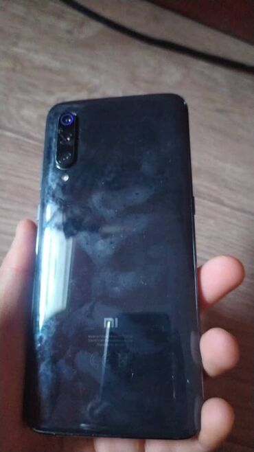 купить в кредит телефон: Xiaomi Mi 9 | Б/у | 128 ГБ | цвет - Серебристый | Рассрочка 
| Наушники, Зарядное устройство, Защитное стекло | Отпечаток пальца