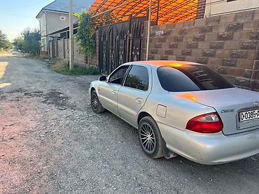 sprinter 4 4: Kia Clarus: 1999 г., Седан — 1