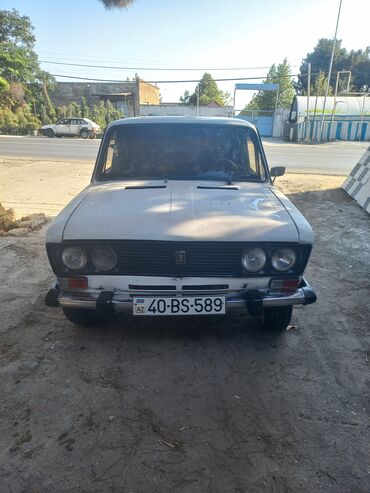 ваз 21099 диски: Ağ rəngdə VAZ 2106 sedan avtomobili. Dörd qapılı bu avtomobil rahat
