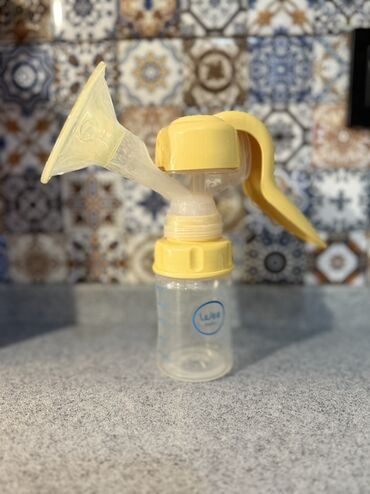 Məktəb çantaları: Süd sağma pompası – əl mexanizmi ilə - Marka: Wee Baby - Növ: Manual