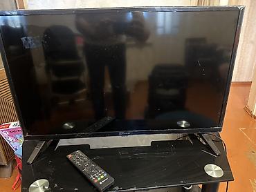 pultu: Zimmer LED televizor + pult - Ekran: təxminən 32" LED panel — 1