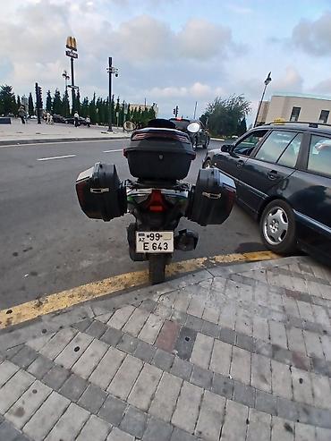 kamaz sekilleri: Şəhərdaxili və uzun məsafələr üçün tam təchizatlı maxi-skutər — 4