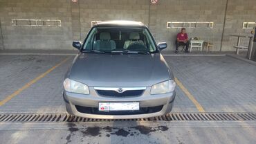 форд мазда: Mazda 323: 1999 г., 1.6 л, Механика, Бензин, Хэтчбэк