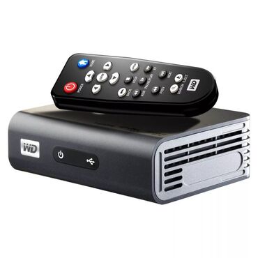 Модемы и сетевое оборудование: Оригинальный сетевой медиаплеер Western Digital TV Live, отличное