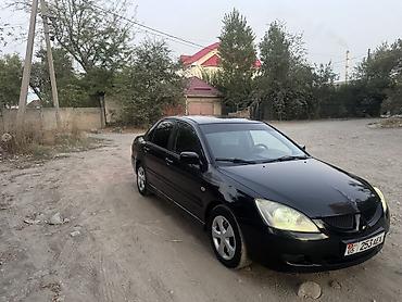 багаж пассат б3: Mitsubishi Lancer: 2004 г., 1.6 л, Механика, Бензин, Седан — 4