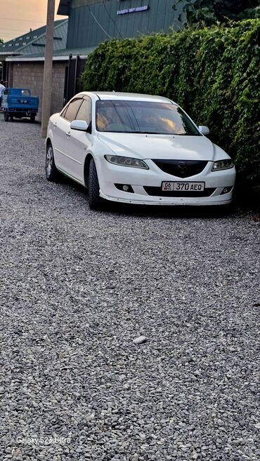 сапог бортовой двух скатный: Mazda 6: 2003 г., 2.3 л, Автомат, Газ, Седан