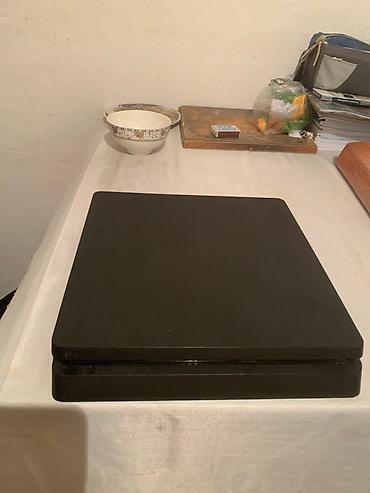 тез арада: Игровая приставка Sony PlayStation 4 Slim в черном корпусе. Компактная — 3