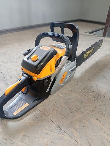 ниже: Бензопила Ubay Tools UB-520 - Тип: бензиновая цепная пила, 2‑тактный — 1