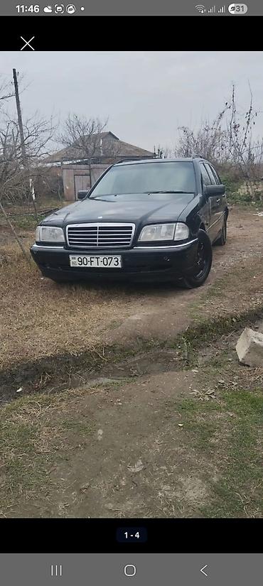 mercedes benz 208 d: Mercedes-Benz C-Class (W202) Universal/Sedan tipli kuzov, qara rəng — 1