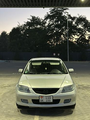 Mazda 323: 2001 г., 1.6 л, Механика, Бензин, Хэтчбэк