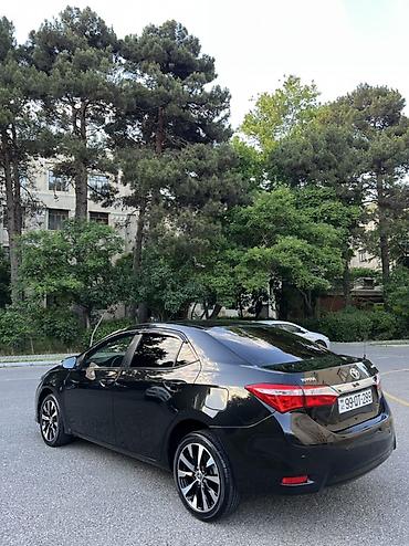 klas 6: Toyota Corolla: 1.6 l | 2014 il Sedan — 6