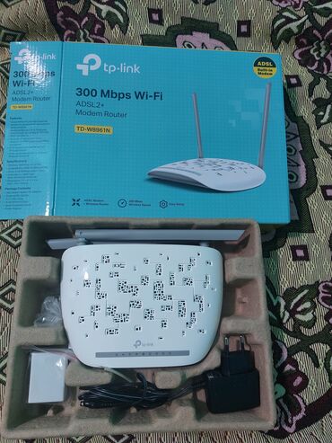 Skanerlər: Salam Tp link 2 antenna 300 mbs gözəl modemdi bilənlər bilir yeni
