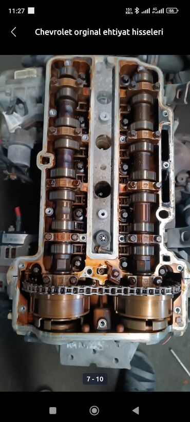Bamperlər, buferlər: Chevrolet avtomobilinin mühərrik hissəsi. Mühərrikdə val və zəncir