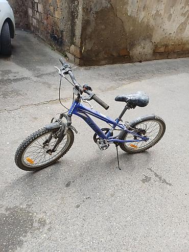 18 dyumlu velosiped: Uşaq velosipedi – 20 düym təkərlər, mavi rəng. Xüsusiyyətlər: - — 4