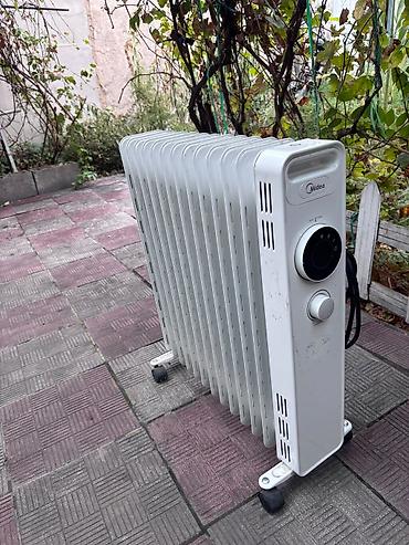 продаю утук: Масляный радиатор Midea - Тип: электрический масляный обогреватель на — 1