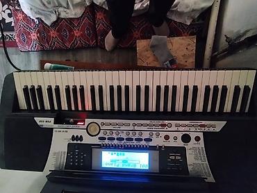Синтезатор Yamaha PSR‑550 - Портативная клавишная станция с 61