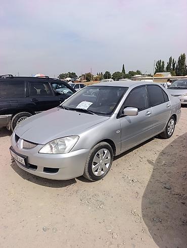 mitsubishi karisma: Mitsubishi Lancer: 2002 г., 1.6 л, Автомат, Газ, Седан — 3
