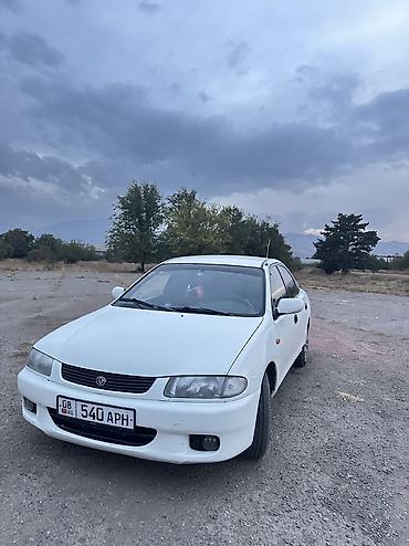 Mazda 323: 1995 г., Бензин, Седан