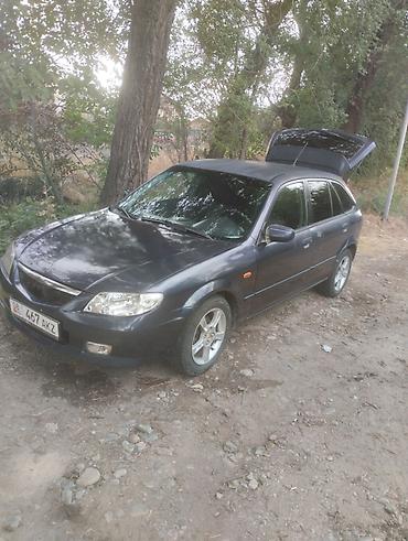 мазда фамили: Mazda Familia: 2003 г., 1.6 л, Механика, Бензин, Универсал — 1