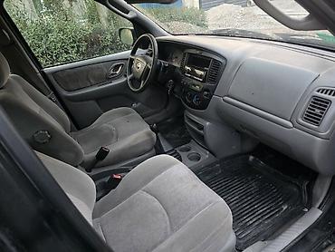 golf iii: Mazda Tribute: 2000 г., 2 л, Механика, Газ, Кроссовер — 9