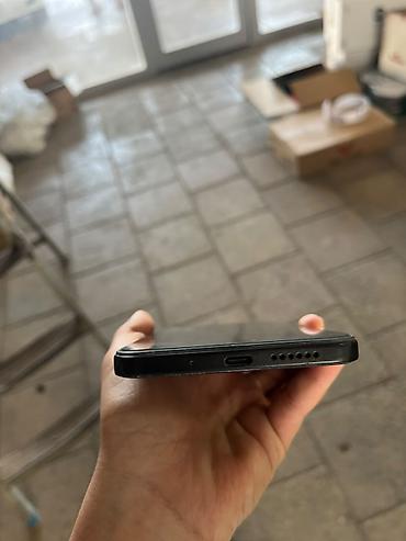 телефон fly f: Xiaomi 15, 128 ГБ, цвет - Черный, 
 Сенсорный, Отпечаток пальца, Face ID — 3