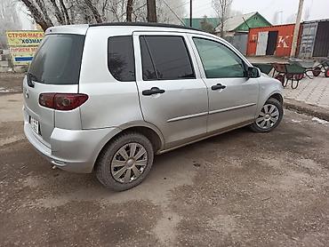 discovery 3: Mazda Demio: 2003 г., 1.4 л, Механика, Бензин, Хэтчбэк — 6