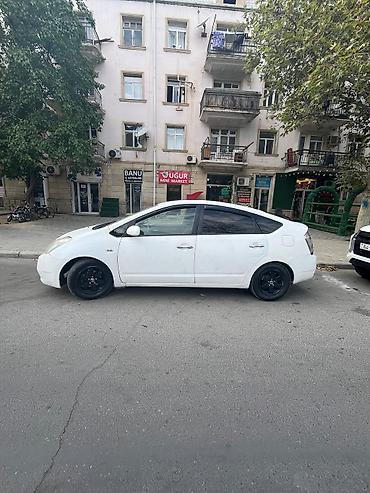 Toyota: Toyota Prius: 1.4 l | 2009 il Sedan — 13