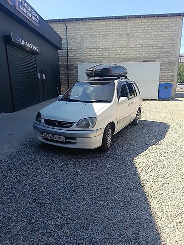 китайский танк: Toyota Raum: 2003 г., 1.5 л, Автомат, Бензин — 1