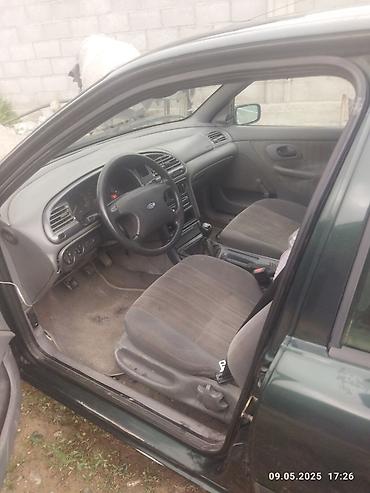 региональный: Ford Mondeo: 1994 г., 1.6 л, Механика, Бензин, Хэтчбэк — 4